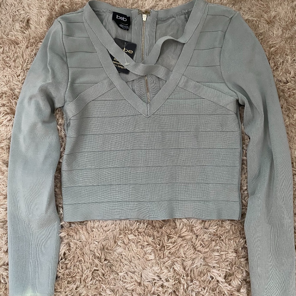 BEBE Bandage Zip Up Cut Out Crop Top